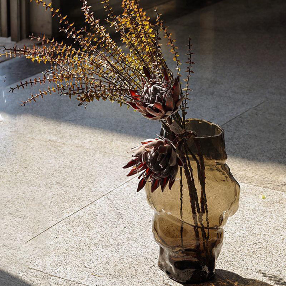 Tall glass vase in abstract design